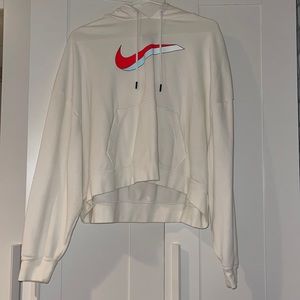 White Nike Hoodie with Colorful Swoosh.